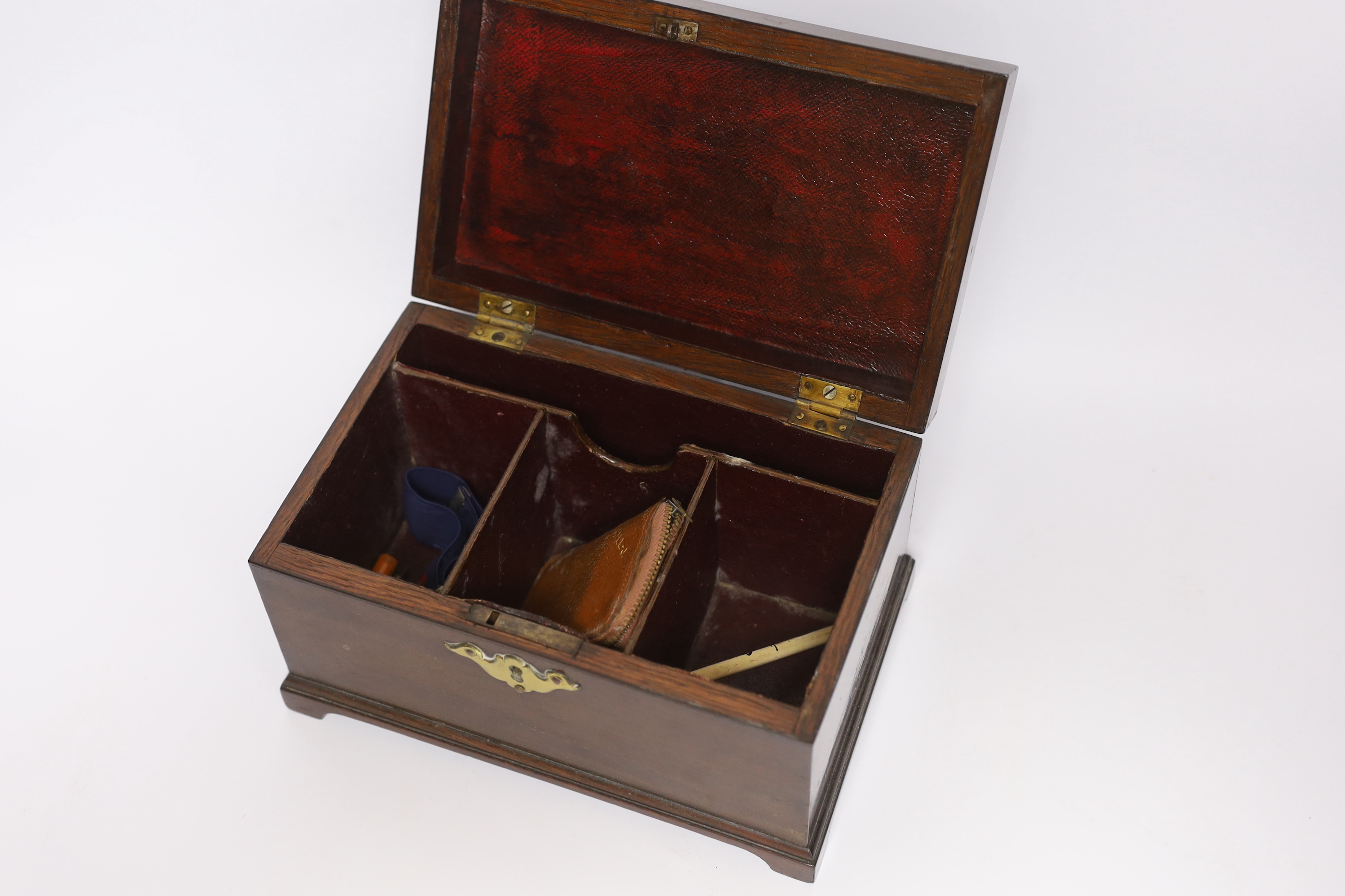 A small George III mahogany tea caddy with divisional interior, 23cm